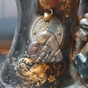 Pendentif cœur de bronze